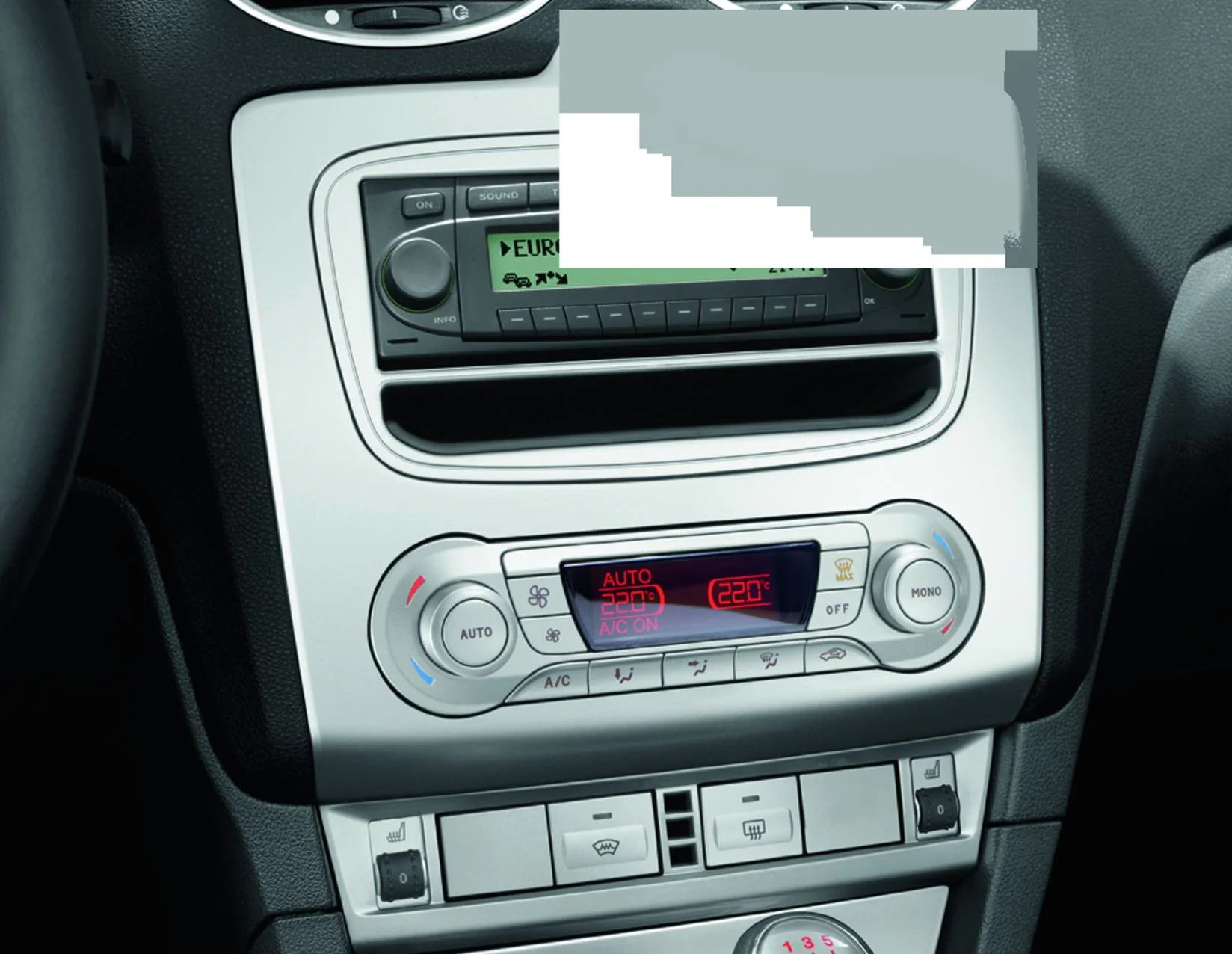 Original Ford Focus/Kuga Embellecedor para radios DIN en color gris asfalto.